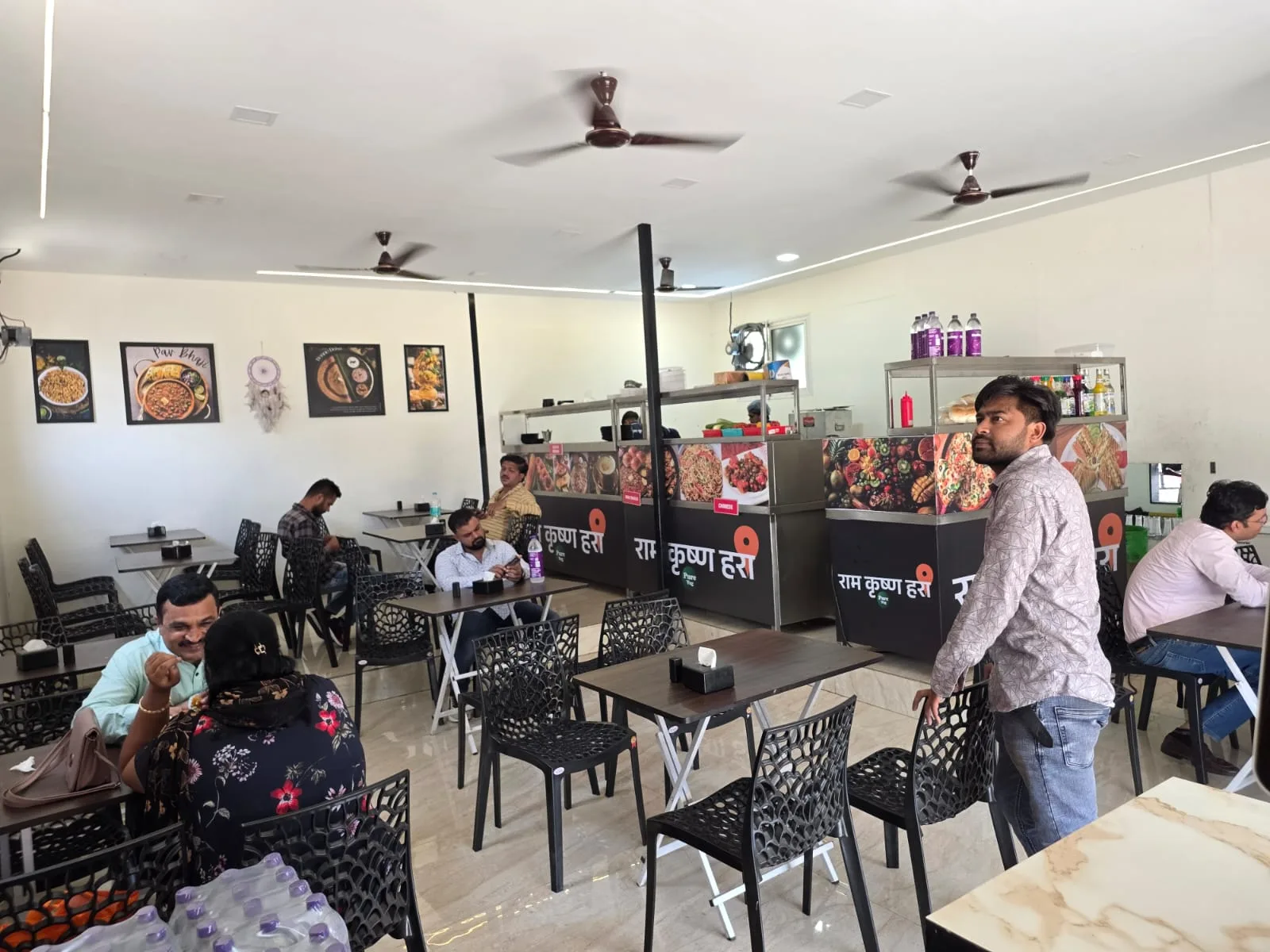 Happy customers enjoying pure veg food at Ram Krishna Hari, Katraj Pune
